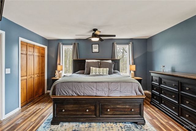 545 County Route 54, Schroeppel, NY 13132 - bedroom featuring wood finished floors, baseboards, a ceiling fan, and a closet
