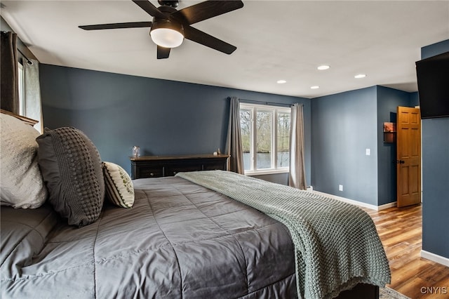 545 County Route 54, Schroeppel, NY 13132 - bedroom featuring wood finished floors, baseboards, recessed lighting, and a ceiling fan