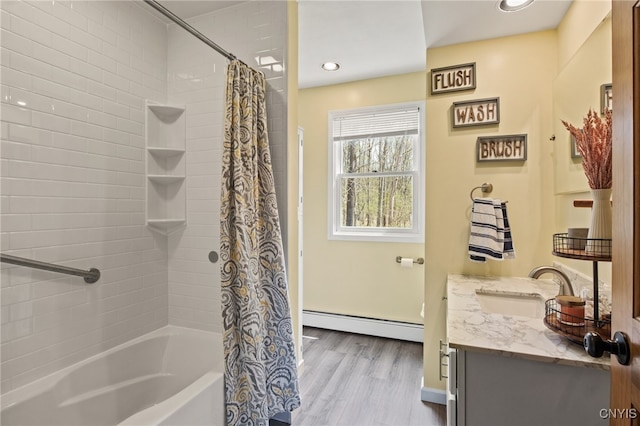 545 County Route 54, Schroeppel, NY 13132 - full bathroom featuring a baseboard radiator, wood finished floors, shower / bathtub combination with curtain, vanity, and recessed lighting