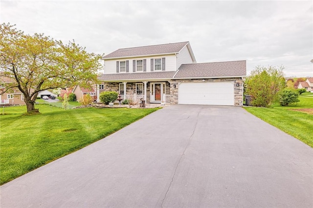 1430 Erie Station Rd, Henrietta, NY 14467 - traditional home featuring covered porch, asphalt driveway, an attached garage, stone siding, and a front yard