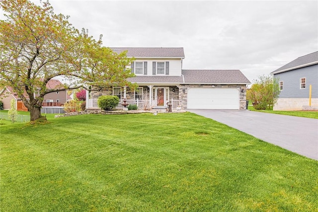 1430 Erie Station Rd, Henrietta, NY 14467 - traditional-style house with covered porch, stone siding, an attached garage, a front lawn, and driveway