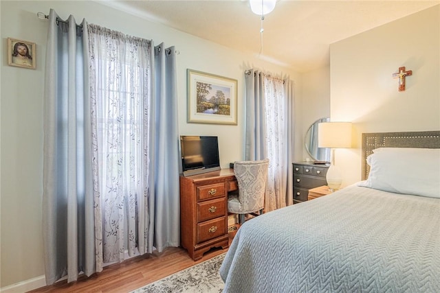 1430 Erie Station Rd, Henrietta, NY 14467 - bedroom featuring wood finished floors