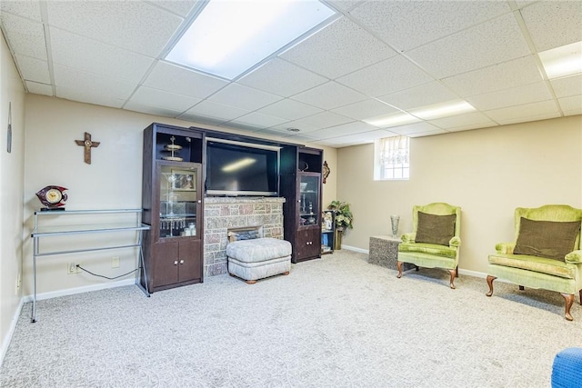 1430 Erie Station Rd, Henrietta, NY 14467 - living room featuring baseboards, a paneled ceiling, carpet, and a fireplace