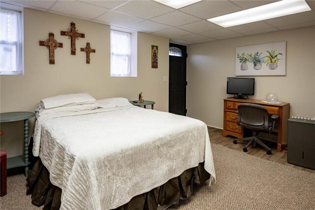 1430 Erie Station Rd, Henrietta, NY 14467 - bedroom with a paneled ceiling and wood finished floors