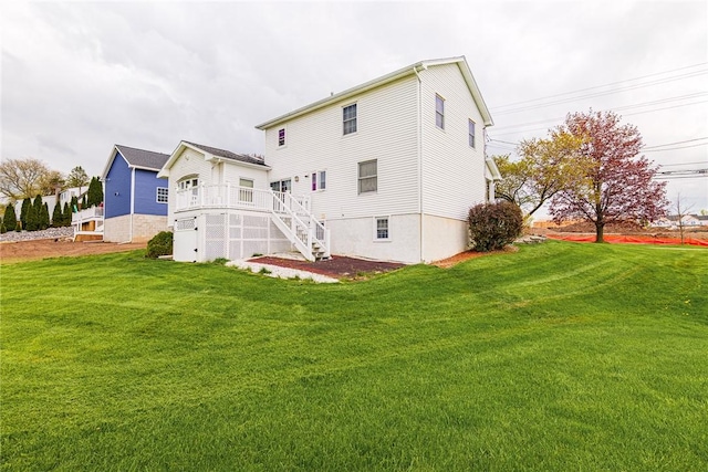 1430 Erie Station Rd, Henrietta, NY 14467 - rear view of property featuring a lawn and stairs