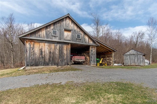 4315 County Route 95, Worth, NY 13659 - view of pole building with a barn, a yard, and driveway