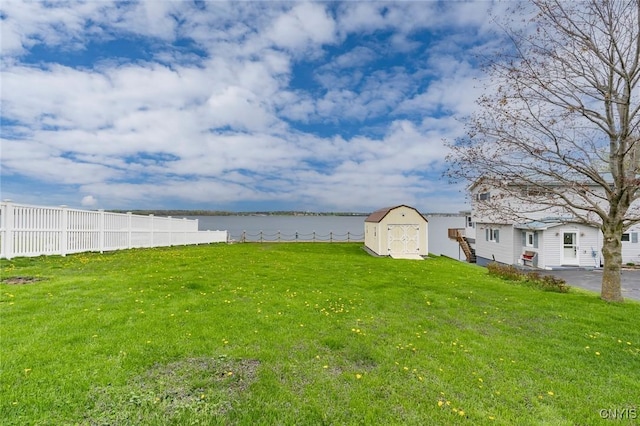 17869 County Route 59, Brownville, NY 13634 - view of yard with a shed, an outdoor structure, and a water view