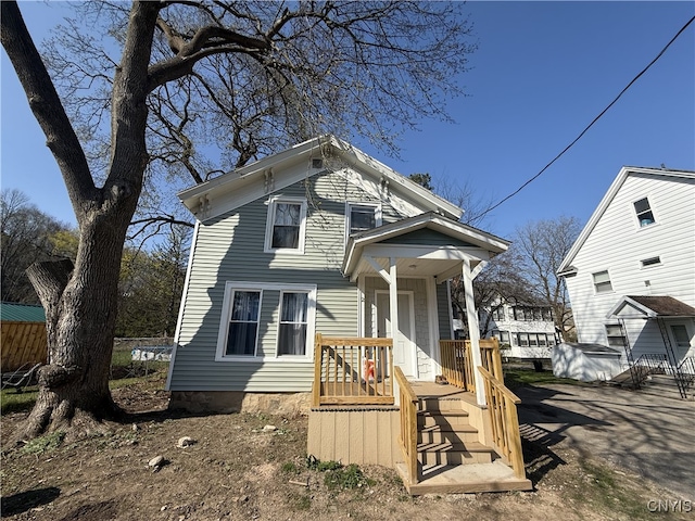 view of front of home with fence