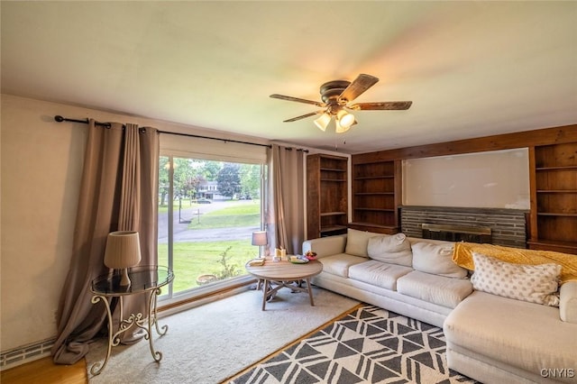 7650 Commodore Cir, Clay, NY 13090 - living room featuring a ceiling fan and built in features