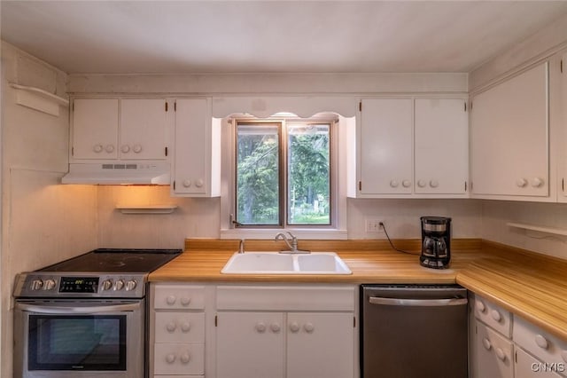 7650 Commodore Cir, Clay, NY 13090 - kitchen featuring stainless steel appliances, under cabinet range hood, a sink, light countertops, and white cabinetry