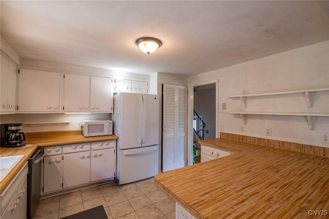 7650 Commodore Cir, Clay, NY 13090 - kitchen featuring white appliances, white cabinets, light countertops, open shelves, and light tile patterned flooring