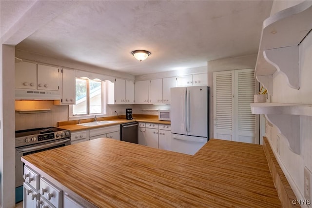 7650 Commodore Cir, Clay, NY 13090 - kitchen with stainless steel appliances, under cabinet range hood, white cabinetry, and a sink