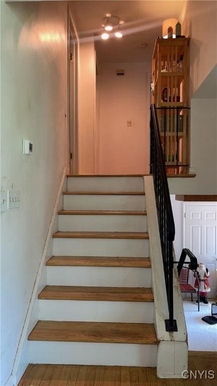 7650 Commodore Cir, Clay, NY 13090 - stairs featuring wood finished floors