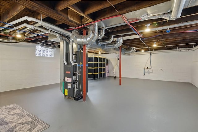below grade area featuring heating unit