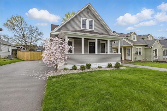 view of front of home featuring a porch and central AC unit