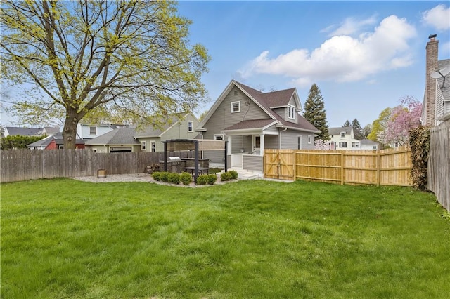 rear view of property featuring a patio area