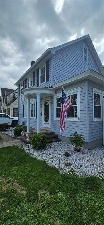 43 Sunnyside Dr, Elmira, NY 14905 - view of front facade featuring a front lawn