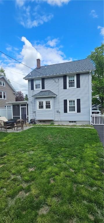43 Sunnyside Dr, Elmira, NY 14905 - rear view of house with a chimney and a sunroom