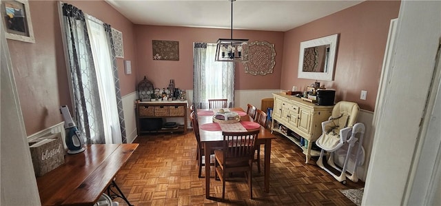 43 Sunnyside Dr, Elmira, NY 14905 - dining space with plenty of natural light and wainscoting