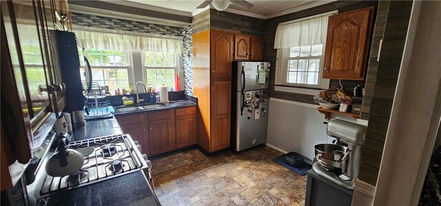 43 Sunnyside Dr, Elmira, NY 14905 - kitchen featuring freestanding refrigerator, gas stove, a sink, a ceiling fan, and baseboards