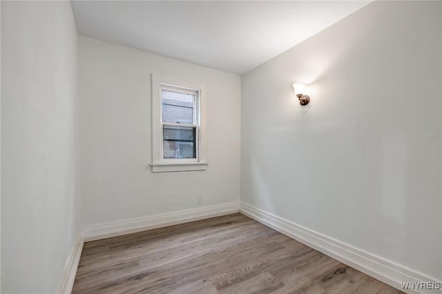329 Jewett Ave, Buffalo, NY 14214 - empty room featuring wood finished floors and baseboards
