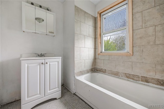 329 Jewett Ave, Buffalo, NY 14214 - bathroom featuring a tub to relax in and tile patterned floors