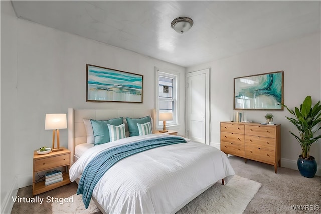 329 Jewett Ave, Buffalo, NY 14214 - carpeted bedroom with baseboards