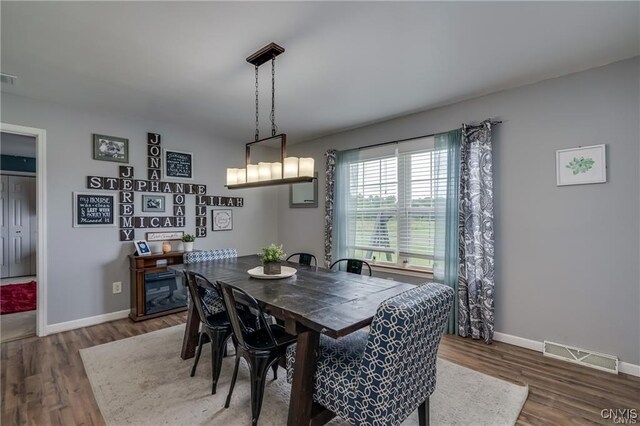 29441 Beaver Meadow Mews, Lyme, NY 13622 - dining space with wood finished floors and baseboards