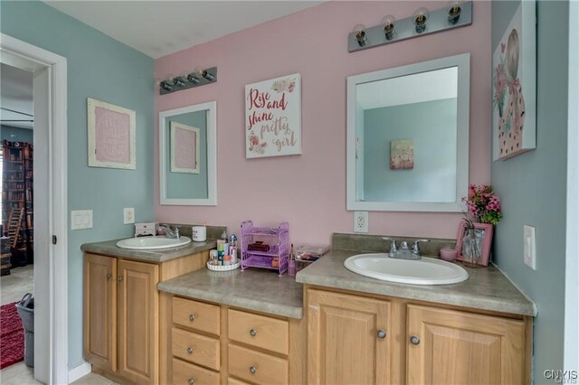 29441 Beaver Meadow Mews, Lyme, NY 13622 - bathroom featuring double vanity