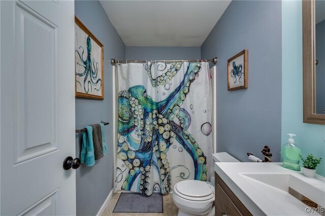 29441 Beaver Meadow Mews, Lyme, NY 13622 - bathroom featuring vanity, toilet, and a shower with curtain
