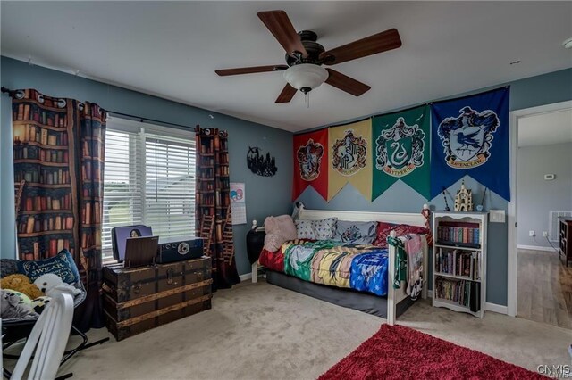 29441 Beaver Meadow Mews, Lyme, NY 13622 - bedroom featuring carpet floors, ceiling fan, and baseboards