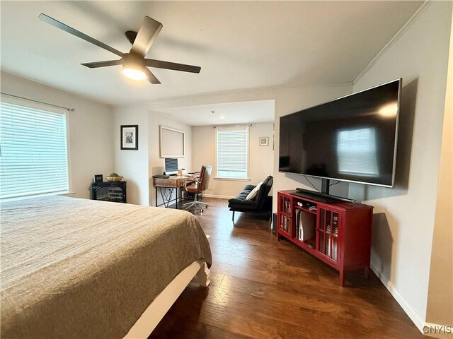 29441 Beaver Meadow Mews, Lyme, NY 13622 - bedroom featuring wood finished floors, baseboards, a ceiling fan, and a desk