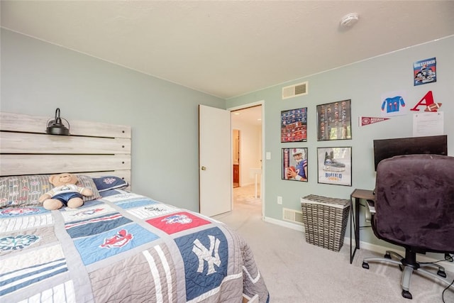 bedroom featuring carpet floors, baseboards, and a desk