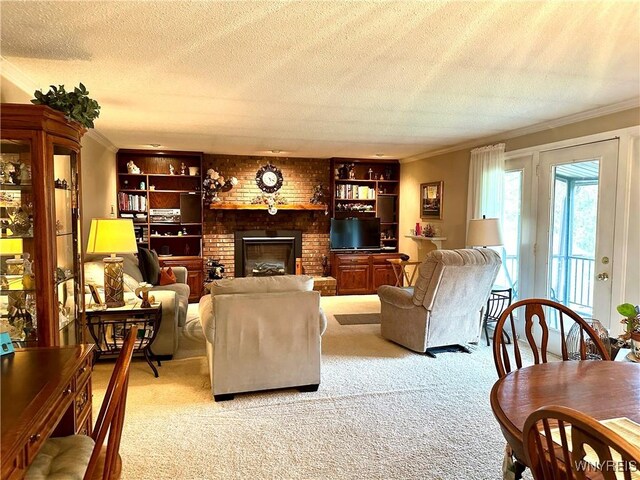 living room featuring crown molding, light colored carpet, a textured ceiling, a brick fireplace, and built in features