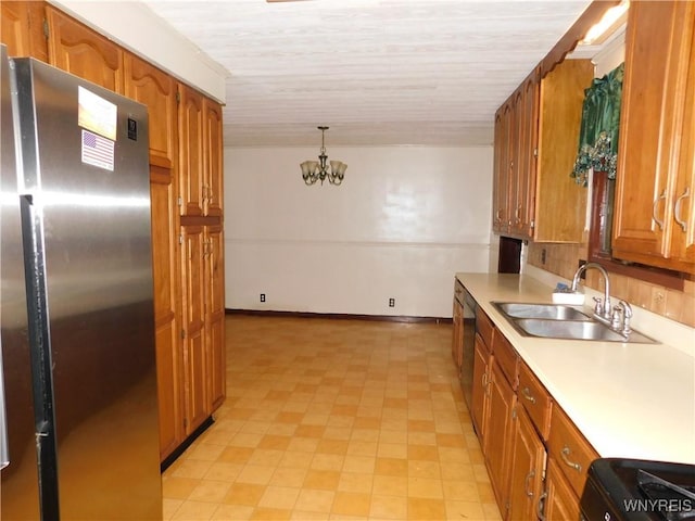kitchen with appliances with stainless steel finishes, a sink, a chandelier, and brown cabinetry