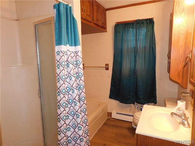 bathroom featuring a baseboard radiator, toilet, wood finished floors, ornamental molding, and wallpapered walls