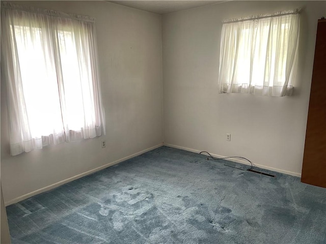 120 Bradley Ct, Horseheads, NY 14845 - carpeted spare room featuring healthy amount of natural light and baseboards
