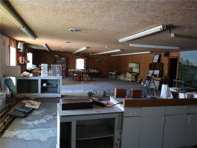miscellaneous room featuring a textured ceiling