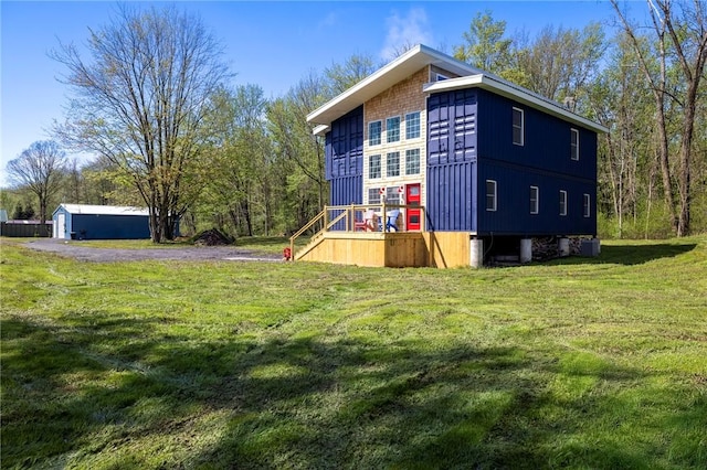986 Caroline Rd, Waterloo, NY 13165 - view of side of home featuring a yard
