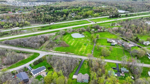 aerial overview of property's location with a nearby body of water