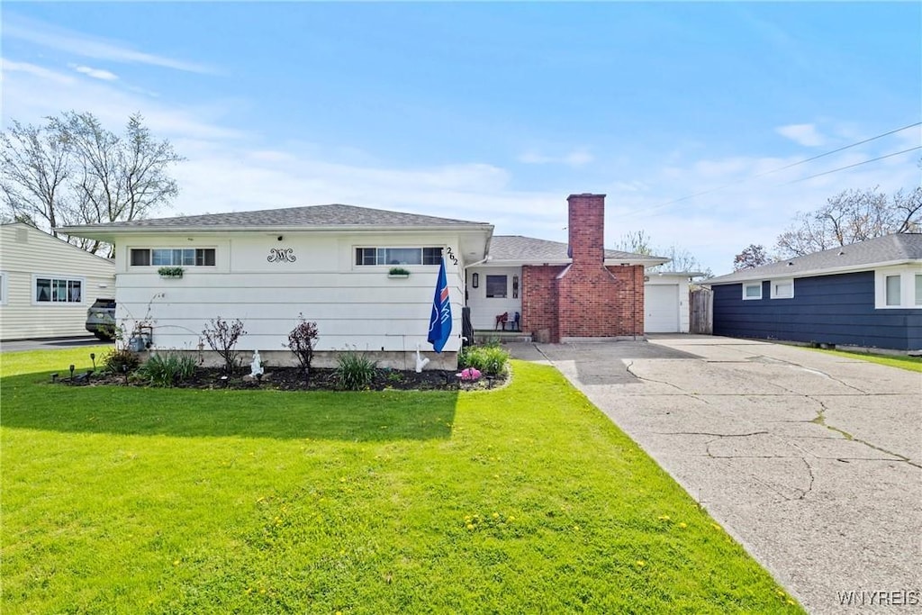 262 Pryor Ave, Tonawanda-Town, NY 14150 - view of front of property featuring a chimney and a front lawn