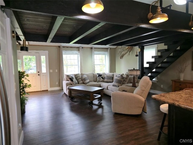 1003 Waterview Dr, Vienna, NY 13308 - living room featuring beamed ceiling, dark wood-style flooring, stairs, wood ceiling, and baseboards