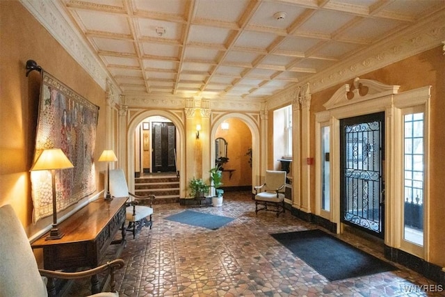 lobby featuring coffered ceiling