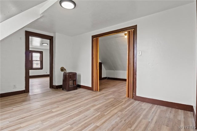 75 Box Ave, Buffalo, NY 14211 - additional living space with light wood-style floors, baseboards, and vaulted ceiling