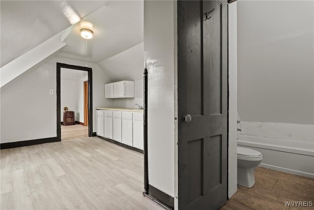 75 Box Ave, Buffalo, NY 14211 - bonus room with light wood-style floors and vaulted ceiling