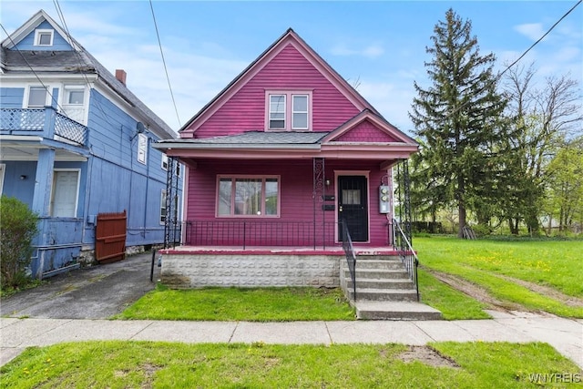 75 Box Ave, Buffalo, NY 14211 - view of front of property featuring covered porch and a front lawn