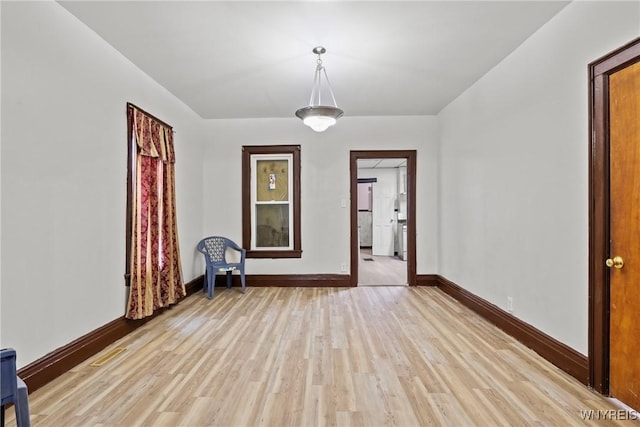 75 Box Ave, Buffalo, NY 14211 - unfurnished room with baseboards and light wood-style flooring