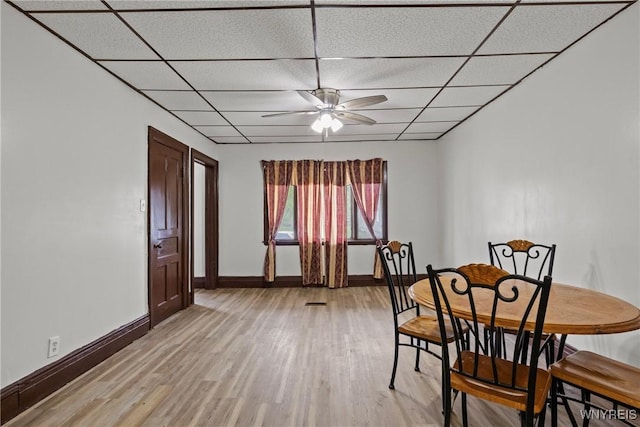 75 Box Ave, Buffalo, NY 14211 - dining room featuring a paneled ceiling, baseboards, ceiling fan, and light wood finished floors