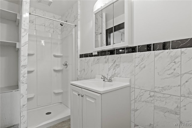 75 Box Ave, Buffalo, NY 14211 - bathroom with a shower stall and vanity