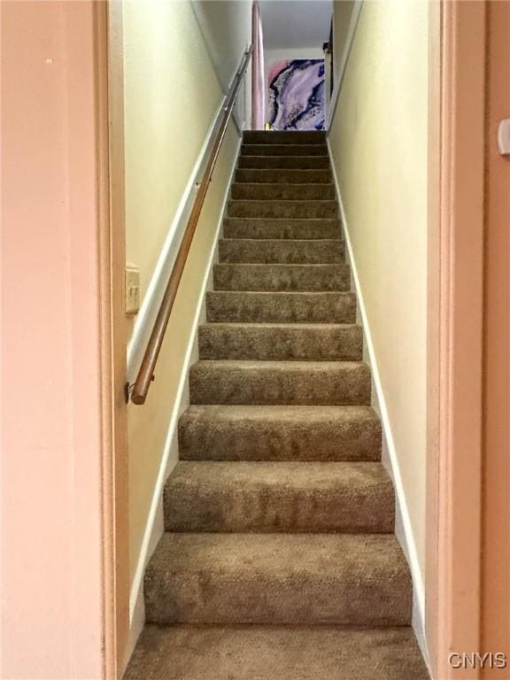 237 James St, Lenox, NY 13032 - stairs featuring carpet and baseboards